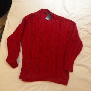 Red Wild Fable, size large V-neck cableknit sweater. NWT. Deliberate pulling
